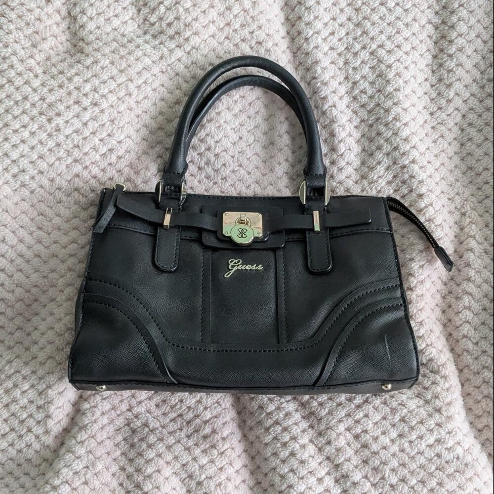 Vintage black and gold Guess monogram handbag with shoulder strap